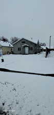 View of yard layered in snow