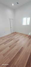 Spare room featuring light hardwood / wood-style floors