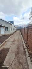 View of property exterior featuring a mountain view