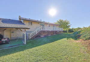 View of yard featuring a deck