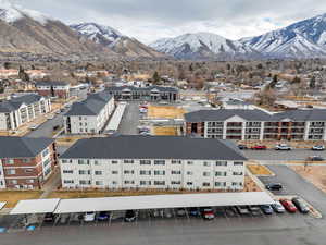 Birds eye view of property with a mountain view