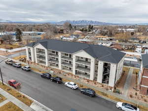 Birds eye view of property with a mountain view