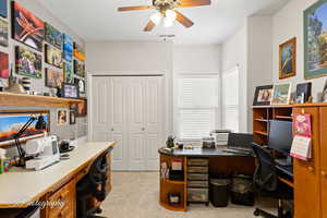 Home office with ceiling fan