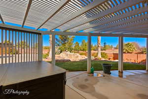 View of patio featuring a pergola