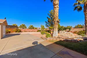 View of yard with a patio area