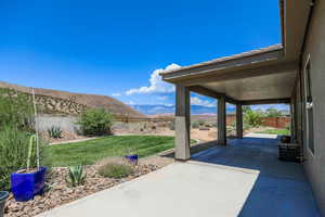 View of patio with a mountain view