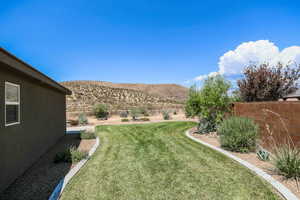 View of yard with a mountain view