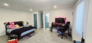 Bedroom featuring light wood-type flooring