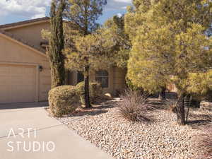 View of front of home featuring a garage