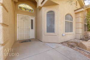 Entrance to property with a patio