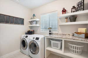 Laundry area featuring washer and dryer