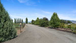 View of road featuring a mountain view and a view of countryside