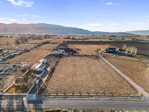 Drone / aerial view with a mountain view and a rural view