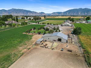 Aerial view of sparsely populated area with a mountainous background