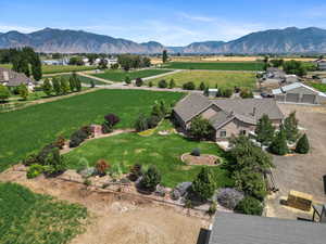 Overview of rural landscape with a mountain backdrop