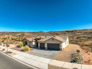 View of front of property featuring a garage