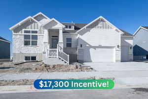 View of front facade with a garage