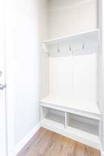 Mudroom featuring light wood-type flooring