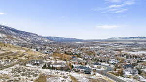 Snowy aerial view with a mountain view