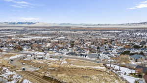 Snowy aerial view with a mountain view