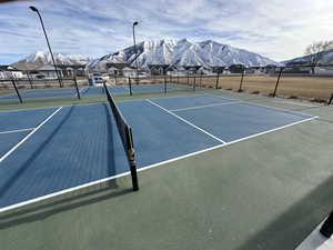View of sport court featuring a mountain view