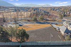 Birds eye view of property with a mountain view