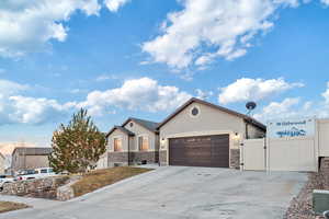 View of front of home featuring a garage