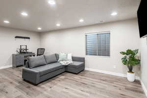 Living room featuring light wood-type flooring