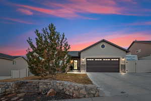 View of front of property with a garage