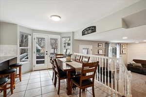 Dining room featuring light tile patterned floors