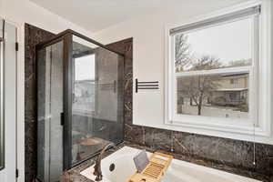 Bathroom with plus walk in shower