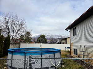 View of pool featuring a mountain view