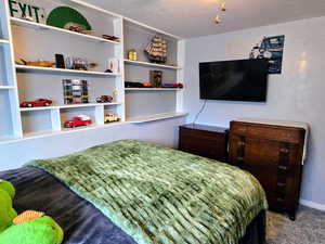 Bedroom featuring carpet flooring