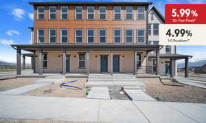 Multi unit property with a porch and stucco siding