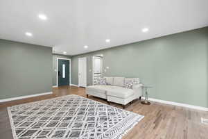 Living room featuring hardwood / wood-style flooring