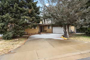 View of front of house with a garage