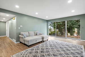 Living room featuring hardwood / wood-style flooring