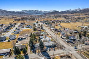 Birds eye view of property with a mountain view