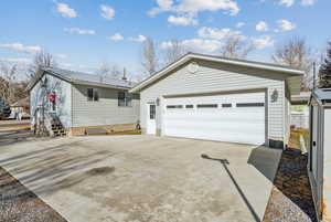 View of front of home with an outdoor structure