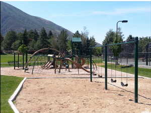 View of play area with a mountain view