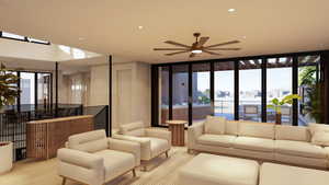 Living room with expansive windows, ceiling fan, and light wood-type flooring