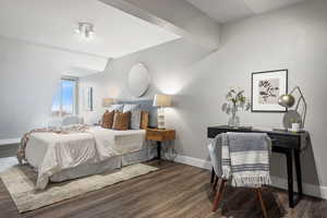 Bedroom featuring dark hardwood / wood-style floors