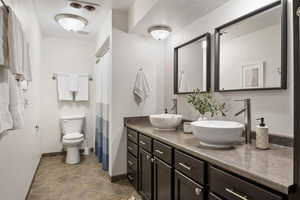 Bathroom with vanity and toilet