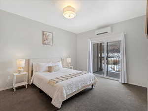 Main bedroom with a sliding door to the patio