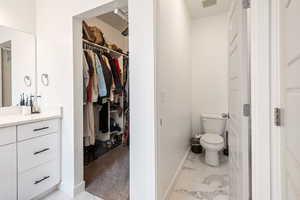 Bathroom featuring vanity and toilet