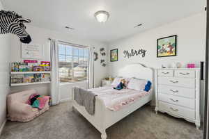 Bedroom featuring carpet flooring