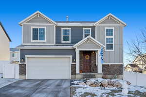 Craftsman-style home with a garage