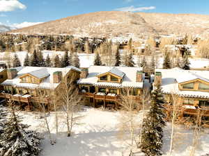 Snowy aerial view with a mountain view