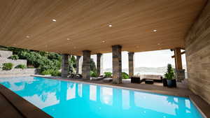 View of swimming pool featuring a mountain view, an outdoor hangout area, and a patio