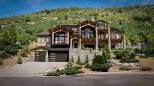 View of front of home featuring a garage